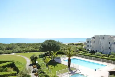 Image de St Cyprien Charmant T2 avec Balcon et piscine en bord de plage