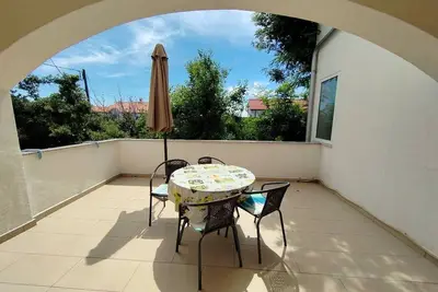 Image de Appartement de deux chambres avec le balcon Barbat, Rab (A-22752-b)