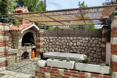 Image de Appartement de trois chambres avec le balcon et la vue sur le mer Barbat, Rab (A-22752-c)