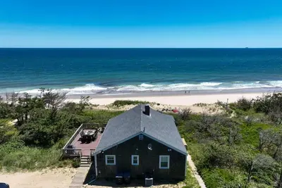 Stunning Waterfront Views, Beach steps away!