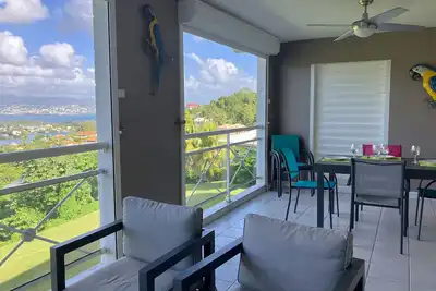 Image de Orchidée, Spacieux et confortable T3 avec vue panoramique sur la baie