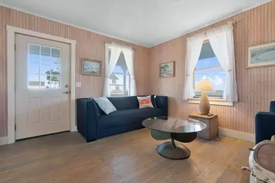 Image de Camp Ellis Beach House with ocean and river views.