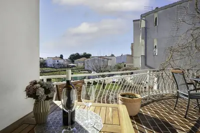 Image de Joli appartement pour 5 personnes avec climatisation, Wifi, Tv, terrasse et parking