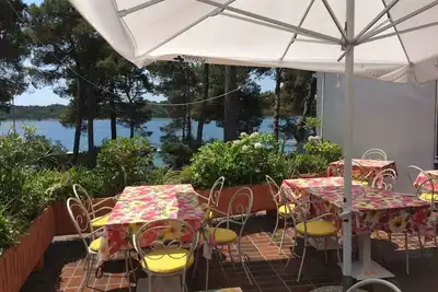 Bel appartement dans une maison de vacances avec climatisation, Wifi, Tv, terrasse, parking
