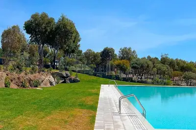 Image de Appartement dans une maison de vacances avec piscine, Wifi, climatisation, Tv, patio, animaux admis