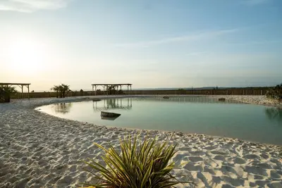 Image de Appartement avec bain à remous, climatisation, Wifi, piscine, Tv, terrasse