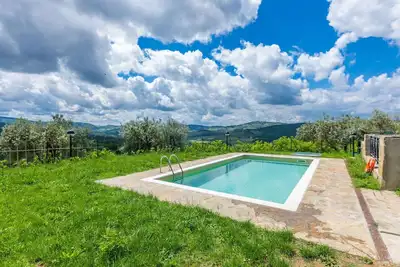 Image de Joli appartement pour 4 personnes avec Wifi, piscine, Tv, patio, animaux admis et vue panoramique