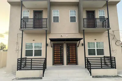 Image de A modern Townhome at Farm. 5 minutes drive from the Providence National Stadium