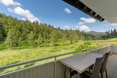 Image de Appartement de vacances à la cascade avec vue sur la montagne, jardin commun et Wi-Fi