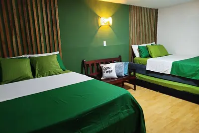 Image de Chambre Familiale Hb5 avec salle de bain privée face à la mer