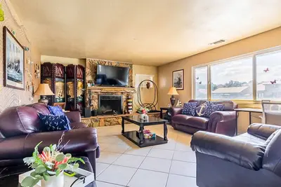 Image de Dog-friendly waterfront home with private beach, firepit, dock, fireplace, grill