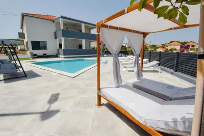Image de Confortable appartement pour 6 personnes avec climatisation, piscine privée, Wifi, Tv et patio