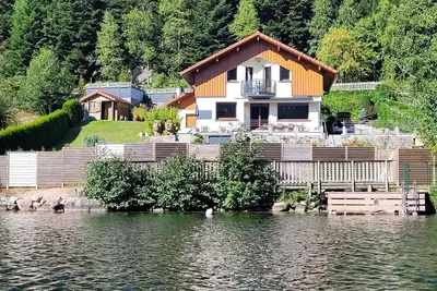 Image de Chalet Acces Direct Au Lac Avec Spa Sauna Pedalo Kayaks