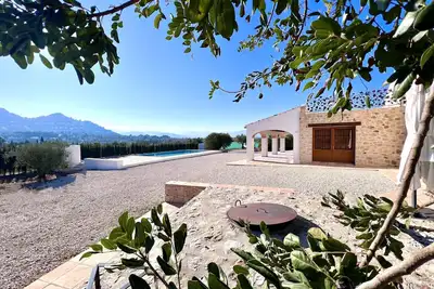 Image de Casa Blanca : propriété rustique pour 14 personnes à La Xara – Jardin, terrasse, environnement rural
