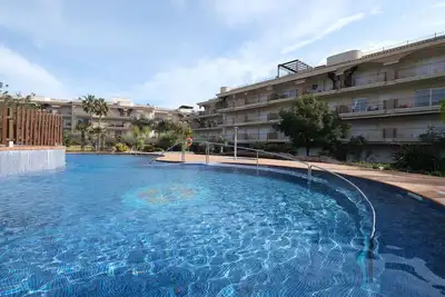 Image de Confortable appartement pour 4 personnes avec piscine, climatisation, Tv, patio et parking