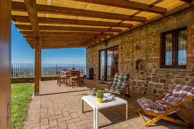 Image de Appartement dans une maison de vacances avec Wifi, terrasse, animaux admis, vue panoramique, parking
