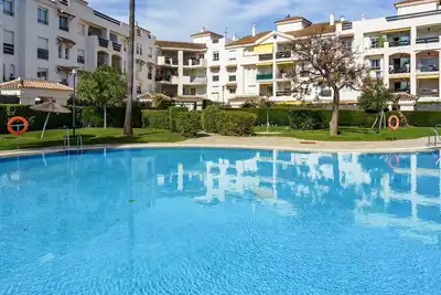 Image de Joli appartement avec climatisation, Wifi, piscine, Tv, terrasse et vue panoramique