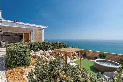 Image de Maison de vacances privée avec Wifi, climatisation, Tv, terrasse, vue panoramique, parking
