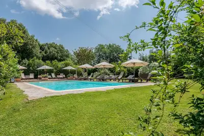 Image de Appartement dans une maison de vacances avec climatisation, piscine, Wifi, Tv, patio, parking