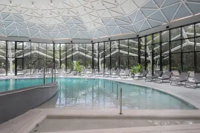 Image de Appartement avec climatisation, bain à remous, Wifi, piscine, Tv, terrasse