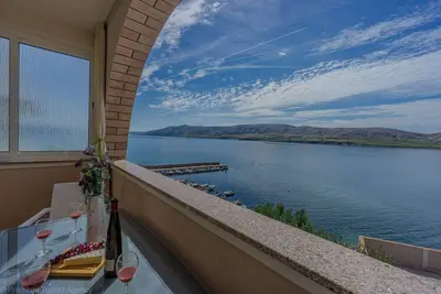 Image de Apartment directly at the beach, shared terrace on the beach with grill
