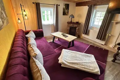 Image de Confortable appartement pour 12 personnes avec bain à remous, Wifi, Tv, patio et animaux admis