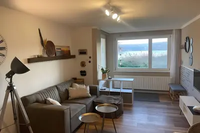 Image de Appartement 'Seezauber Direkt Am Wasser' avec vue sur le lac, terrasse privée et Wi-Fi