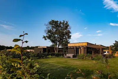 Image de The Amalia is a 4-person holiday home with a cozy and homely living room with an open kitchen, 2 bedrooms, and a spacious outdoor area.