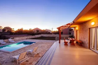 Image de Maison de vacances pour 7 personnes env. 130 qmà Privlaka, Dalmatie (Nord de la Dalmatie)