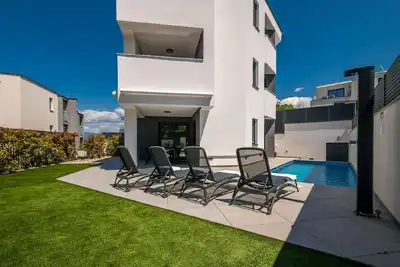 Image de Appartement de vacances Njivice pour 1 - 4 personnes avec 2 chambres à coucher - Appartement de vaca