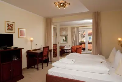 Image de Junior Suite \"goldeck\" bis 4 Nächte mit Frühstück - Romantik Spa Hotel Seefischer am Seesuperior