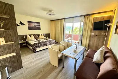 Image de Appartement fĂĽr 2-4 Pers. mit Balkon u. Seeblick - Appartements Diana