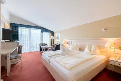 Image de Panorama Zimmer mit Blick Über den See - Hotel Alexanderhof