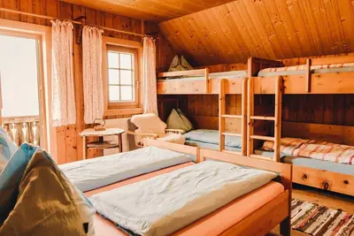 Image de Mirnock - 6-bett Familienzimmer mit Ostbalkon - Alexanderhütte