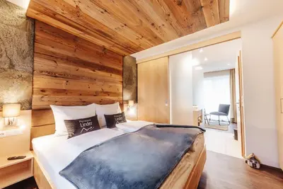 Image de Familienzimmer Innenhof - Pension Linder