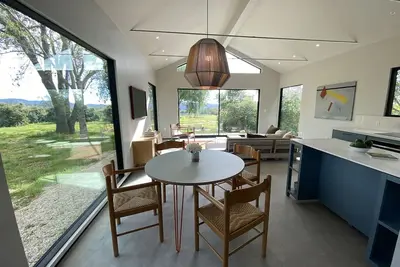 Image de Sunlight filled retreat on acres of organic orchards with mountain views.