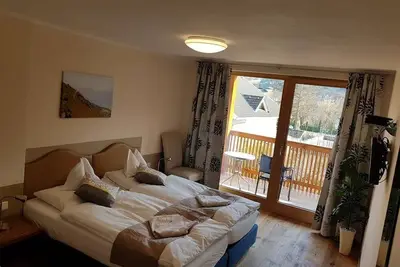 Image de Superior Doppelzimmer Goldeck mit Südbalkon - Gästehaus Bärwald