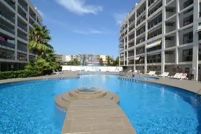 Image de Joli appartement pour 4 personnes avec Wifi, climatisation, piscine, Tv et terrasse