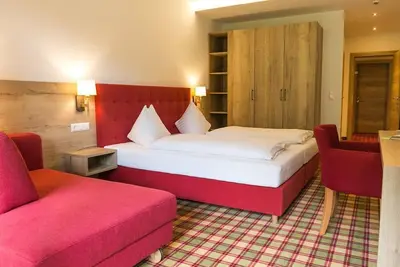 Image de Dreibettzimmer - Familiengut Hotel Burgstaller