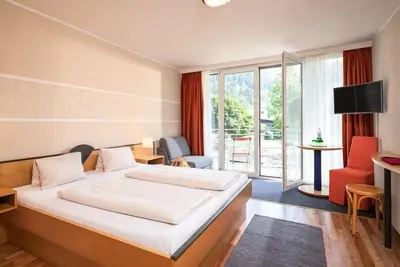 Image de Doppelzimmer \"nockberge\" mit Frühstück - Hotel zur Post 3superior - Ihr Familienhotel