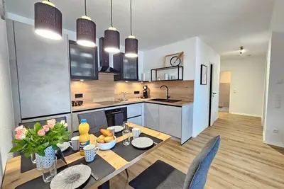 Image de Fewo Küstenquartier Dornumersiel - Hier Können Sie Entspannen. Die Neue Ferienwohnung Küstenquartier