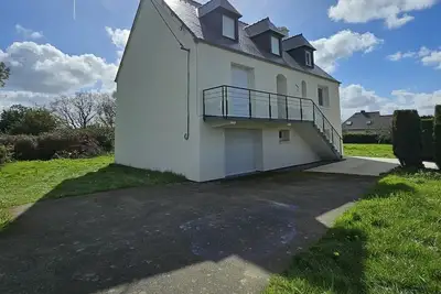 Image de charmante maison familiale, idéalement située pour un séjour en bord de mer