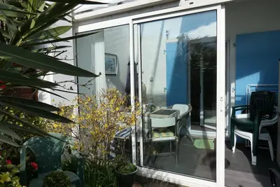 Image de Charmante maison à 400m de la plage des Demoiselles avec véranda et cour close