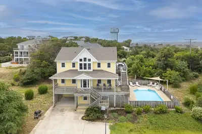 Semi soundfront home in Duck w/ pool, hot tub, & lots of community amenities!