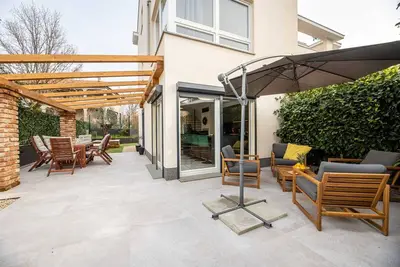 Image de The 5-Star Retreat at The Olive Tree Apartment