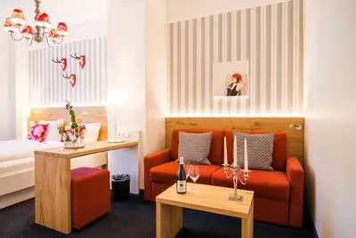 Image de Superior room with 2 beds & 1 sofa bed, max. 4 persons