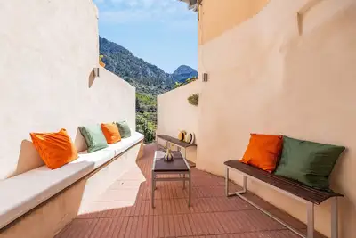 Image de Maison de vacances 'Ca's Forner' avec vue sur la montagne, terrasse privée et Wi-Fi
