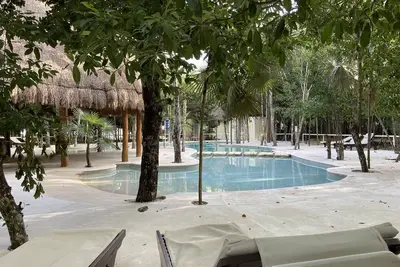 Image de Élégance et confort : appartement avec piscine à Puerto Morelos