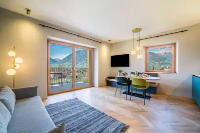 Image de Appartement 'Villa Rosa Unterschöberlehof - Eliza' avec vue sur la montagne, Wi-Fi et climatisation