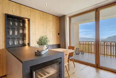 Image de Appartement de vacances 'Lodge Melisse' avec vue sur les montagnes, terrasse privée et sauna privé